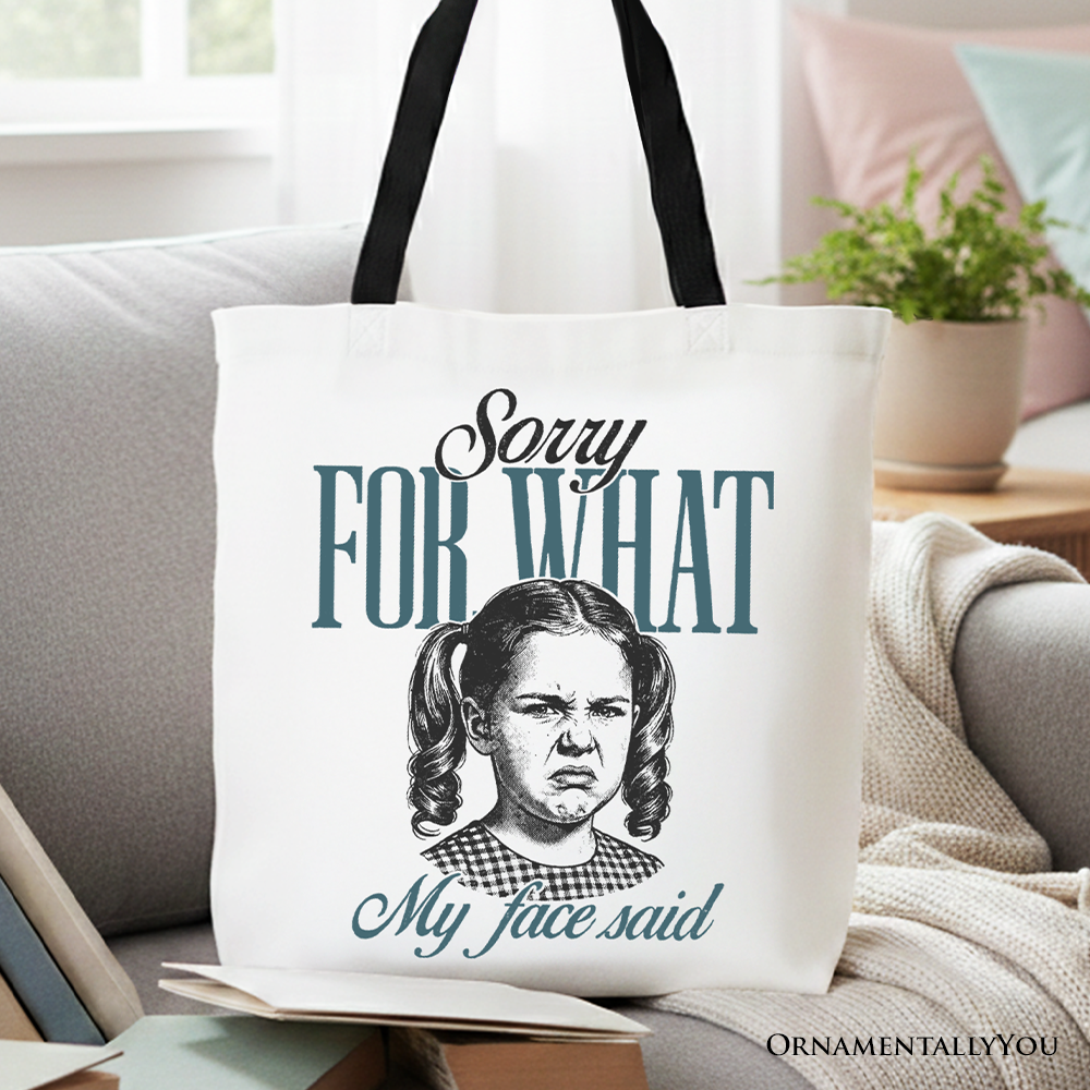 Vintage style canvas tote bag with the text Sorry For What My Face Said printed on the front