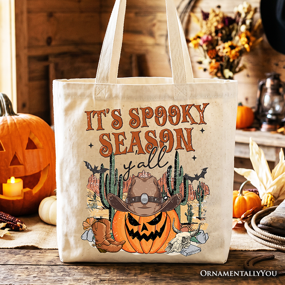 Western-themed It's Spooky Season Y'all graphic on a spacious canvas tote bag