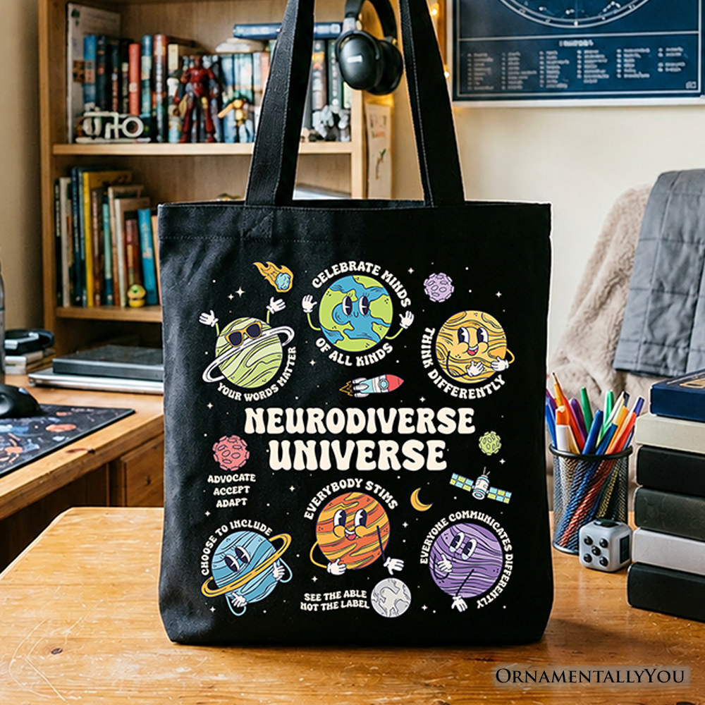 Neurodiverse Universe autism awareness graphic on a black and multicolor cotton canvas tote bag.