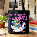 Off To Cause A Kerfuffle graphic tote bag featuring a frog, raccoon, and goose on cotton canvas.
