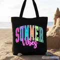 Neon varsity text that reads Summer Vibes on a durable canvas beach tote bag.