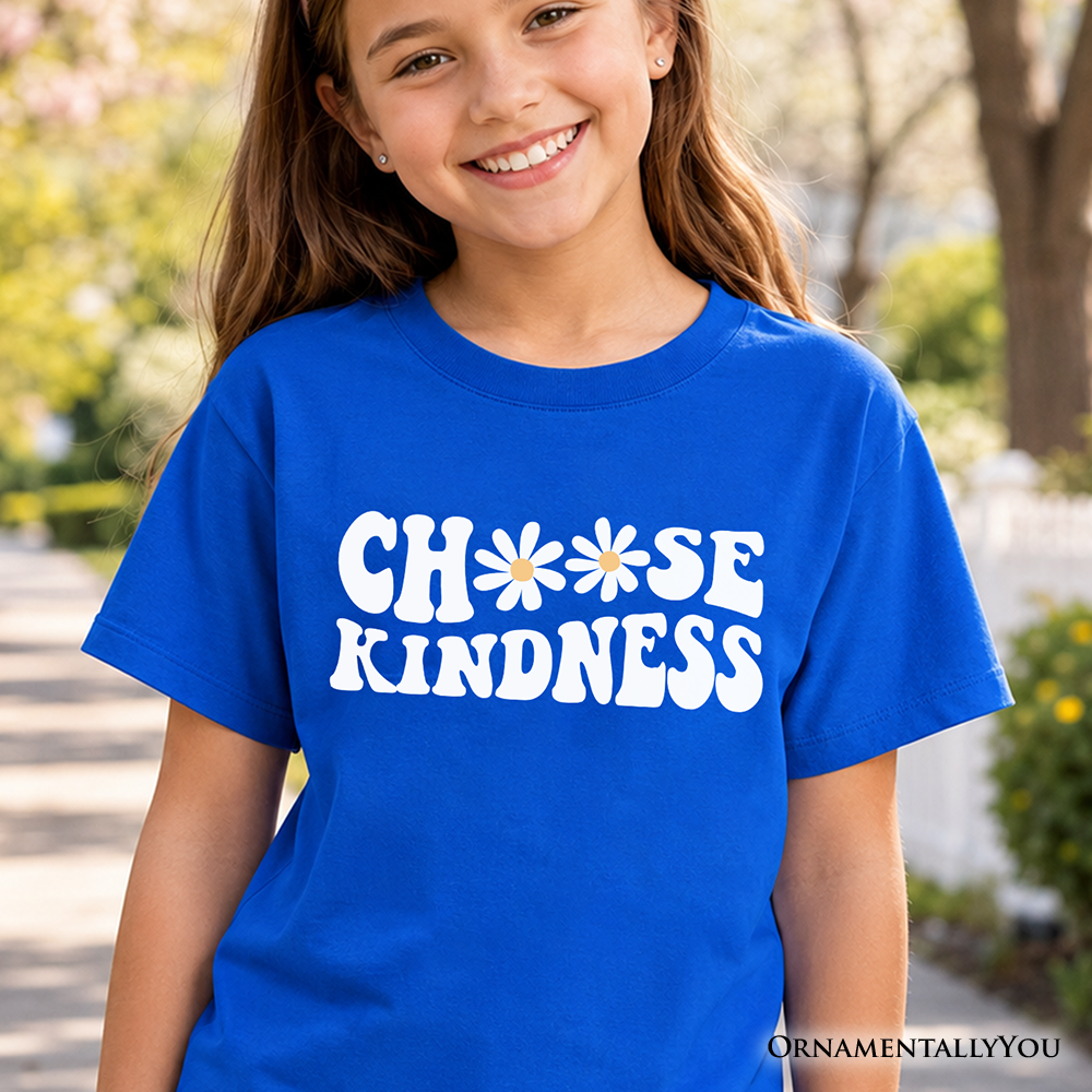 Youth wearing a retro-style Choose Kindness Daisies graphic t-shirt in blue, pink, and teal