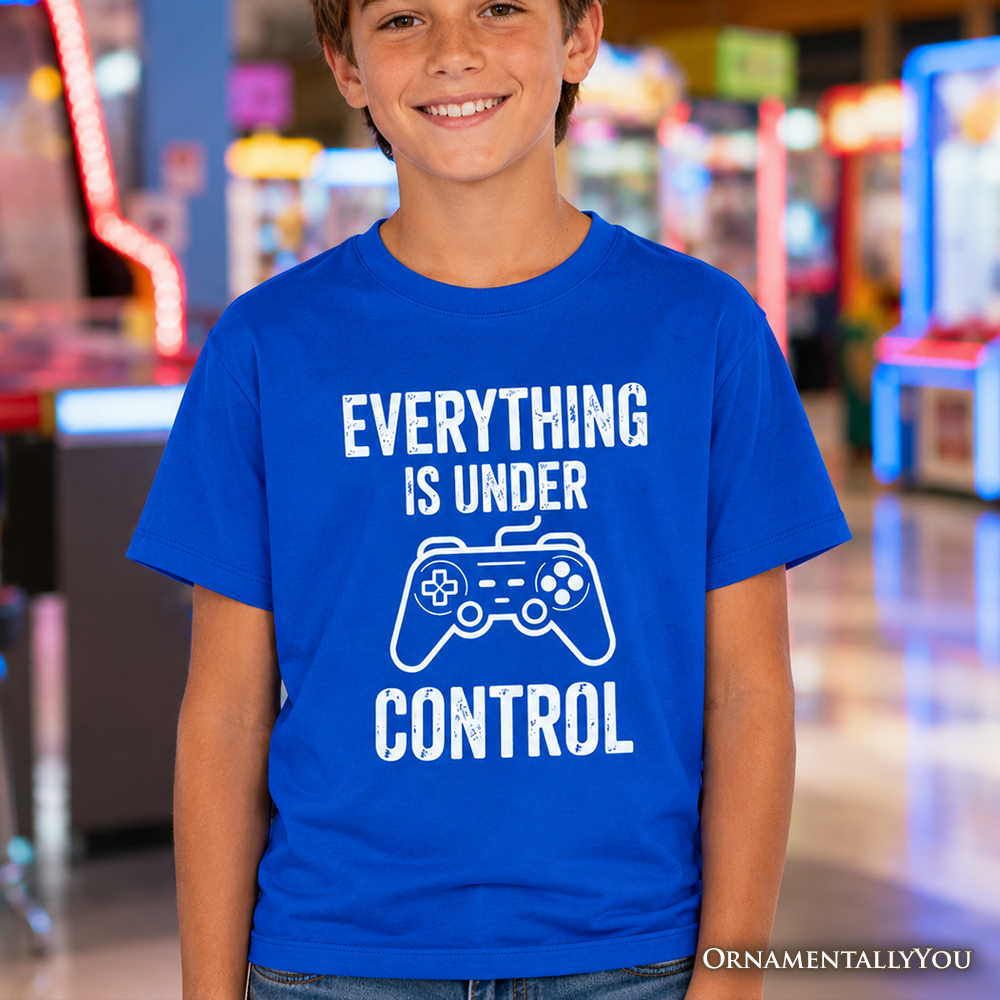 A child wearing a vibrant graphic gamer t-shirt with 'Everything Is Under Control' text, styled for a casual, sporty look.