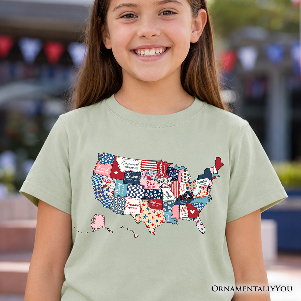 A close-up of a kids t-shirt featuring a patriotic USA map in a patchwork quilt design