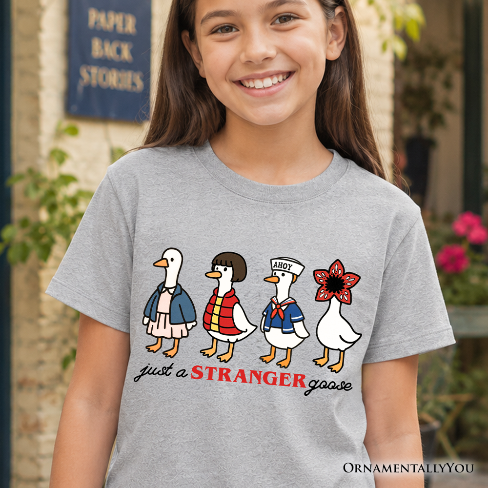 A child wearing a retro Just a Stranger Goose graphic t-shirt in heather grey, modern casual style.
