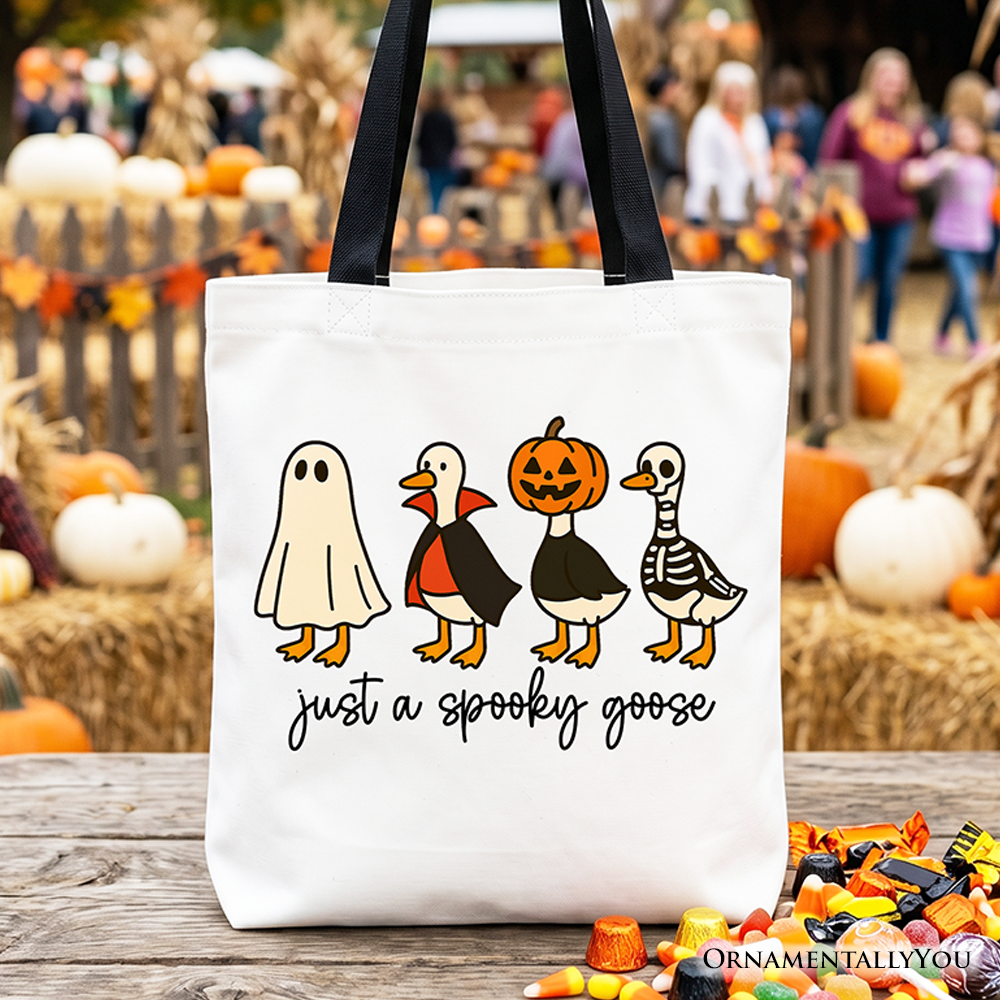 A canvas tote bag featuring an adorable spooky goose graphic for Halloween.
