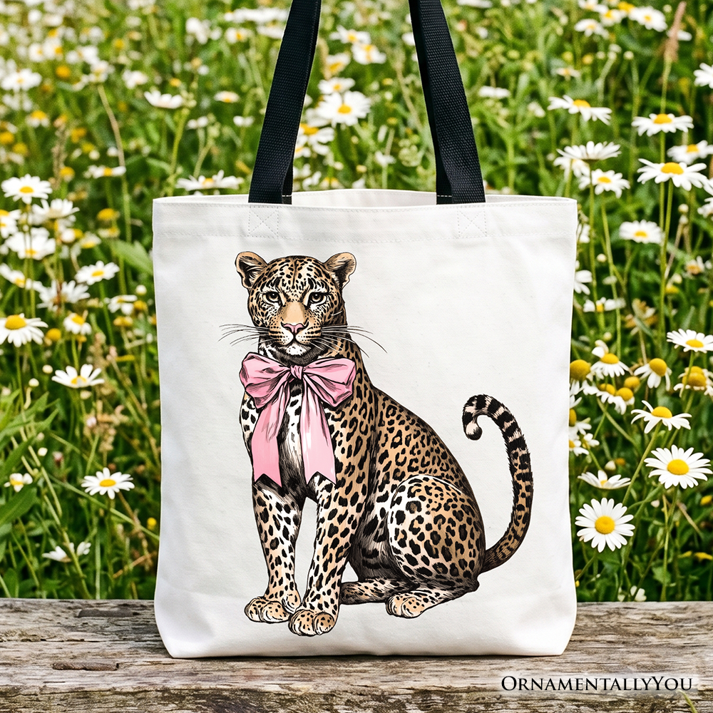 White canvas tote bag with a leopard print coquette bow design, 15x16 inch shopper