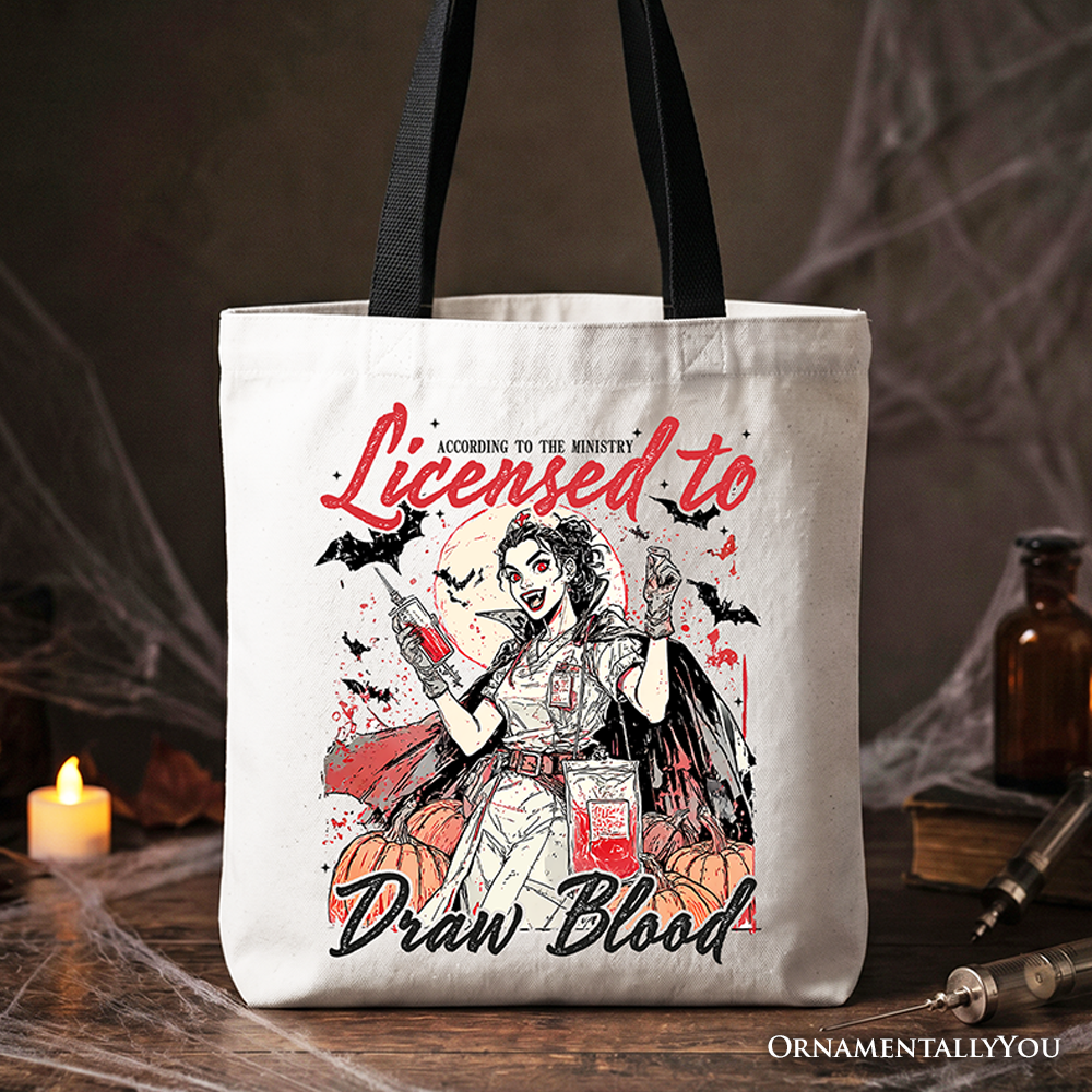 Spooky season canvas nurse tote bag with Licensed to Draw Blood graphic on a neutral background