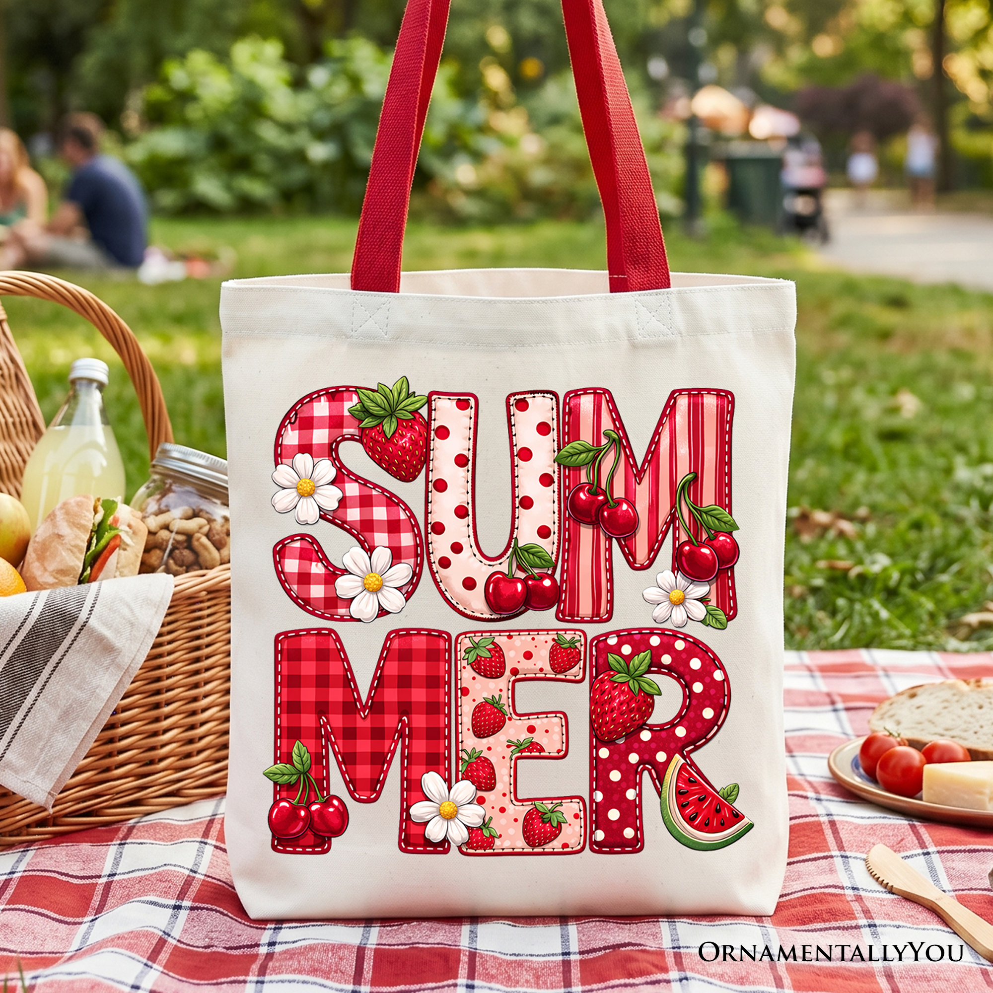 Off-white cotton canvas tote bag featuring a vibrant strawberry and cherry patchwork fruit print.