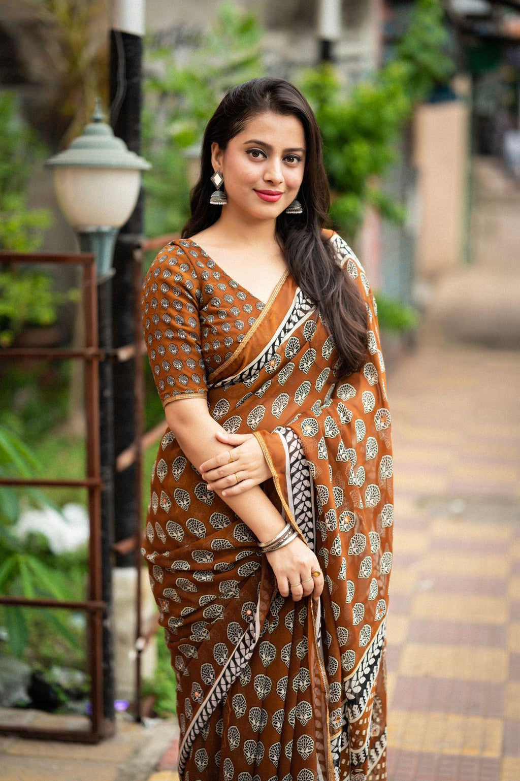 Mustard Poly Georgette Ajrak Saree with Mirror Work