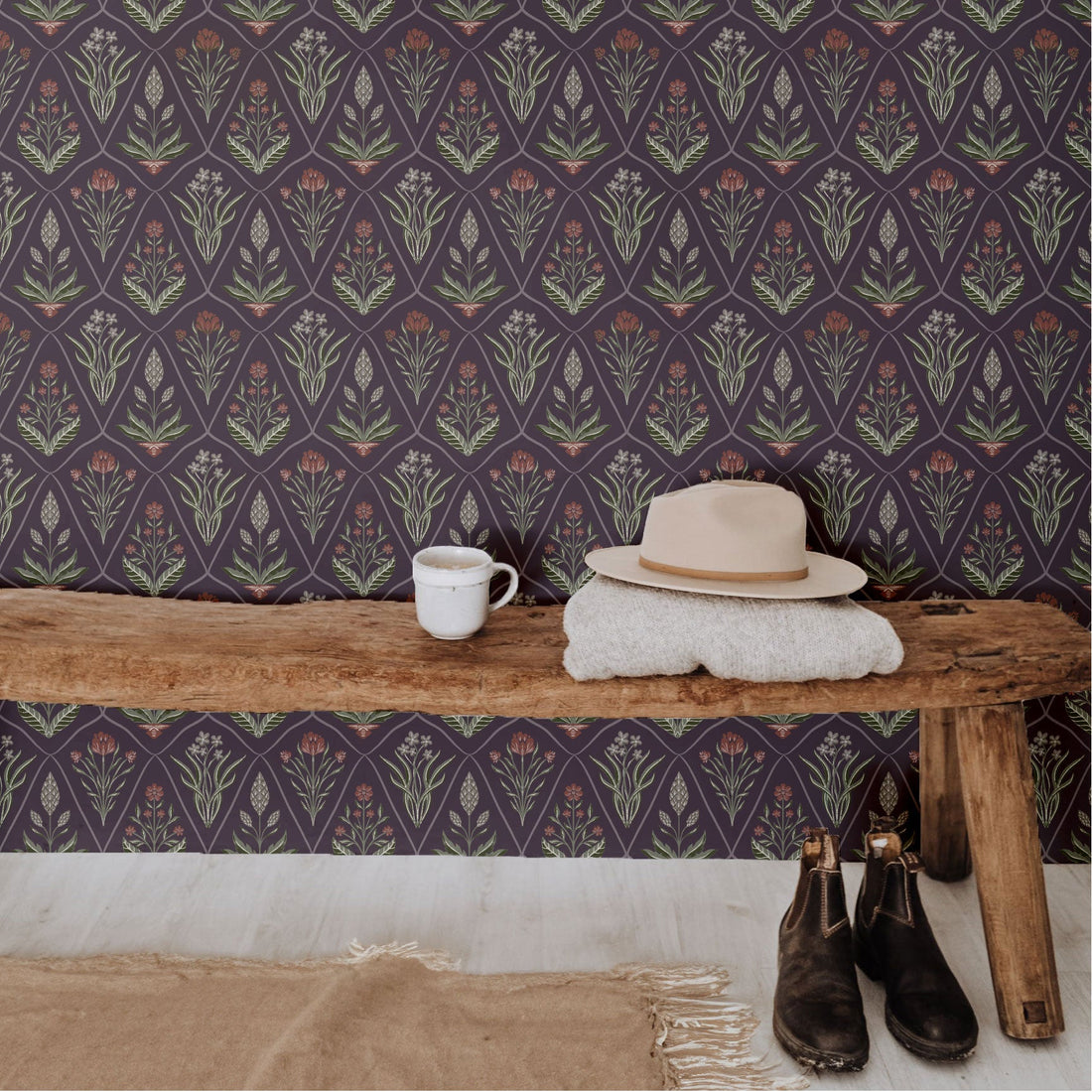 Bohemian floral wallpaper pattern in dark-purple, sage-green, and terracotta colors.