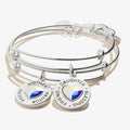 Set of two mother daughter heart charm bangles in a classic metal finish