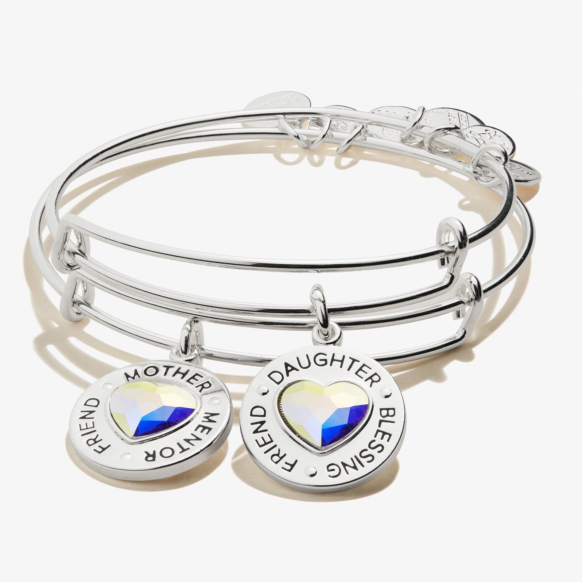 Set of two mother daughter heart charm bangles in a classic metal finish
