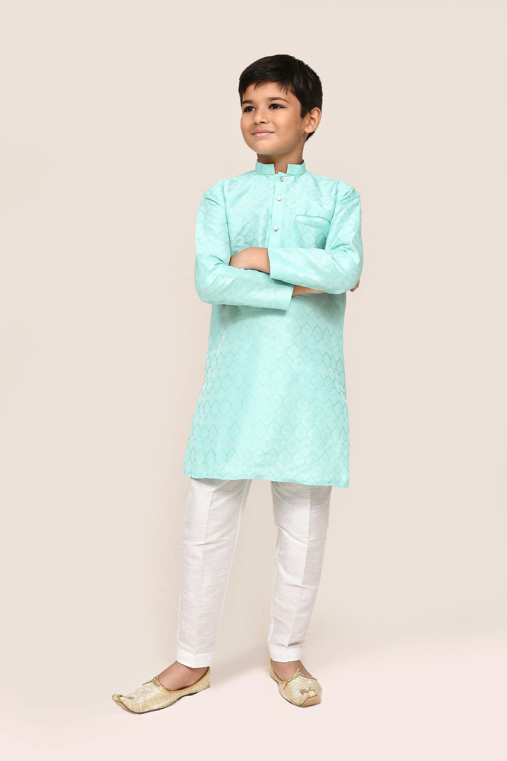 Ocean green cotton silk kurta paired with clean white straight-fit pants