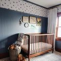 Melvin patterned removable wallpaper applied to a living room accent wall