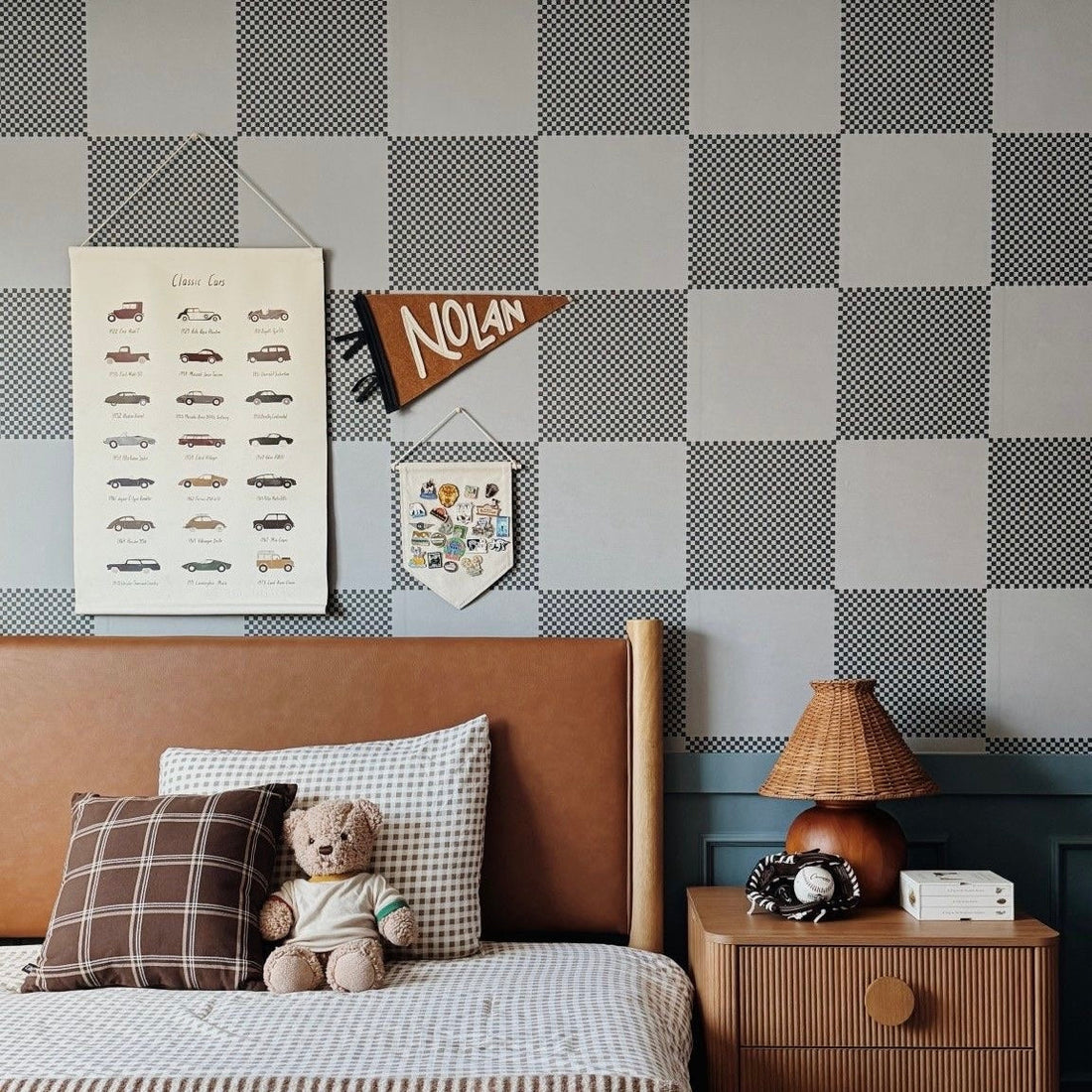 Modern grey and white geometric print removable wallpaper on a minimalist living room wall