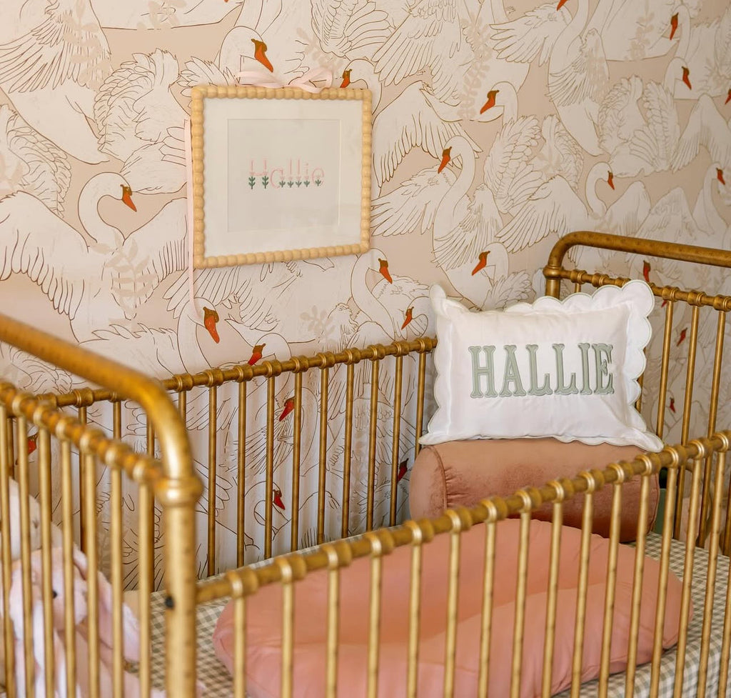 Gia animal print wallpaper in blush-pink, white, and terracotta