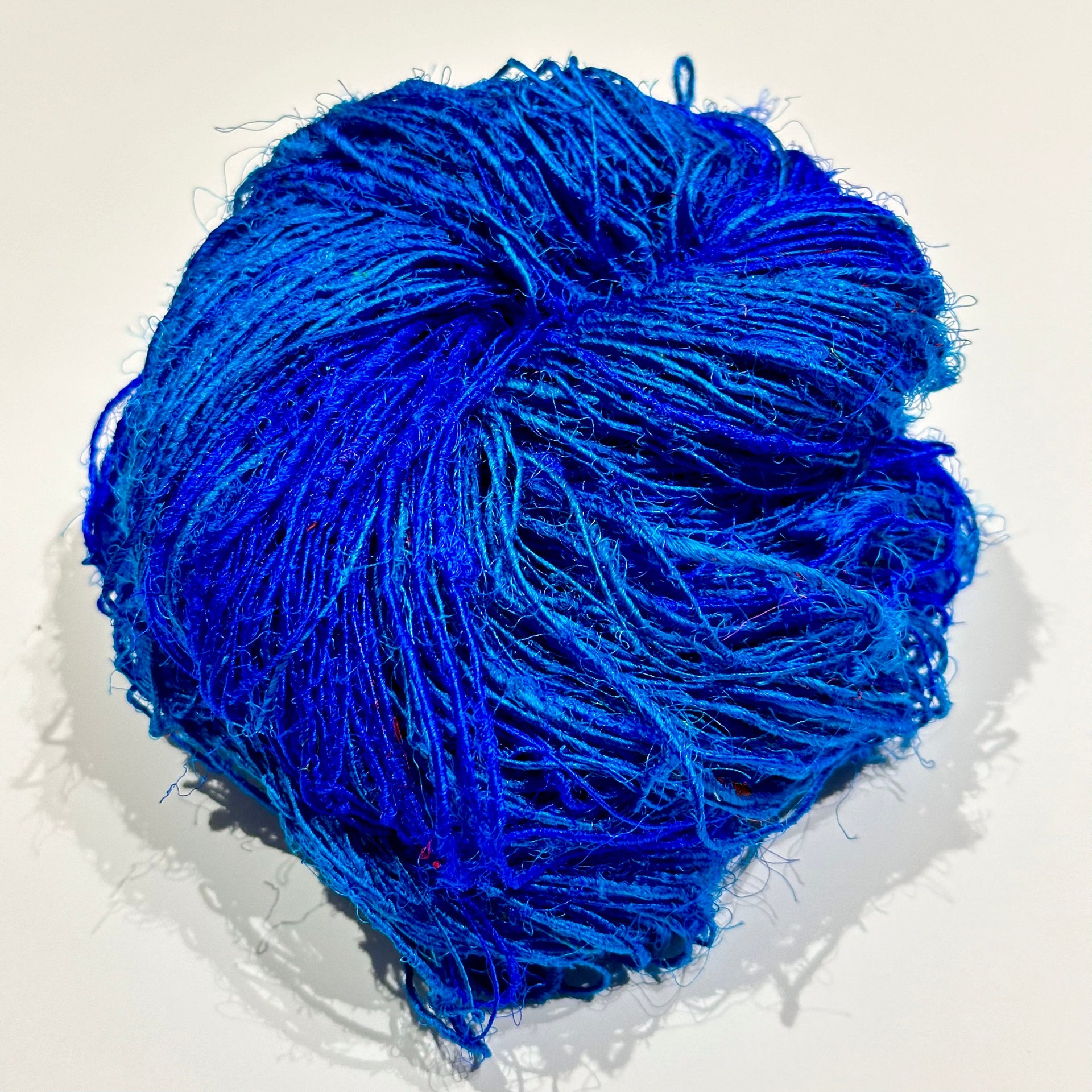 Lux Adventure Recycled Silk Yarn in Vibrant Teal and Purple