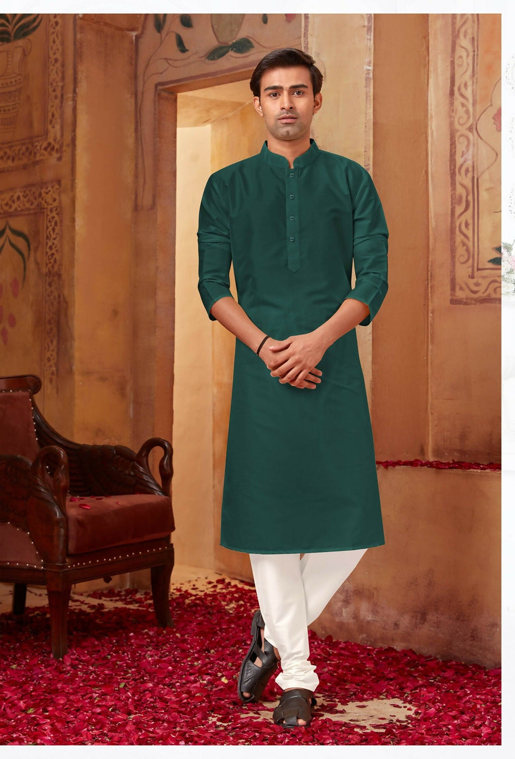Toddler boy in a deep bottle green art silk kurta with off-white bottoms