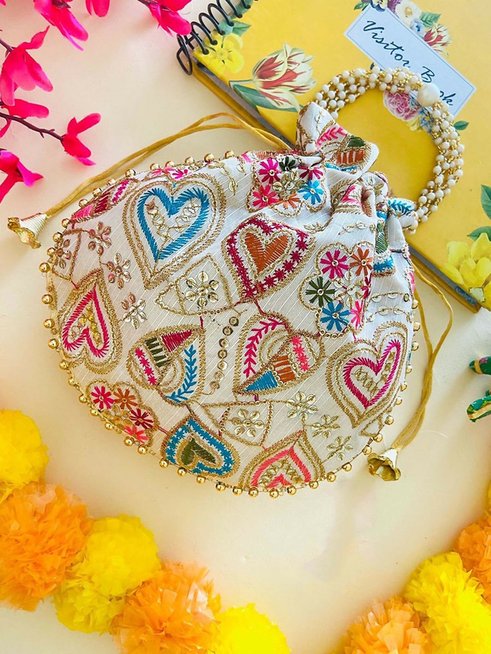 Multicolor synthetic potli bag measuring 9 inches by 9 inches, perfect for ethnic wear.