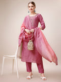 Woman wearing a multicolor hand-embroidered rayon kurta set with matching pants and dupatta
