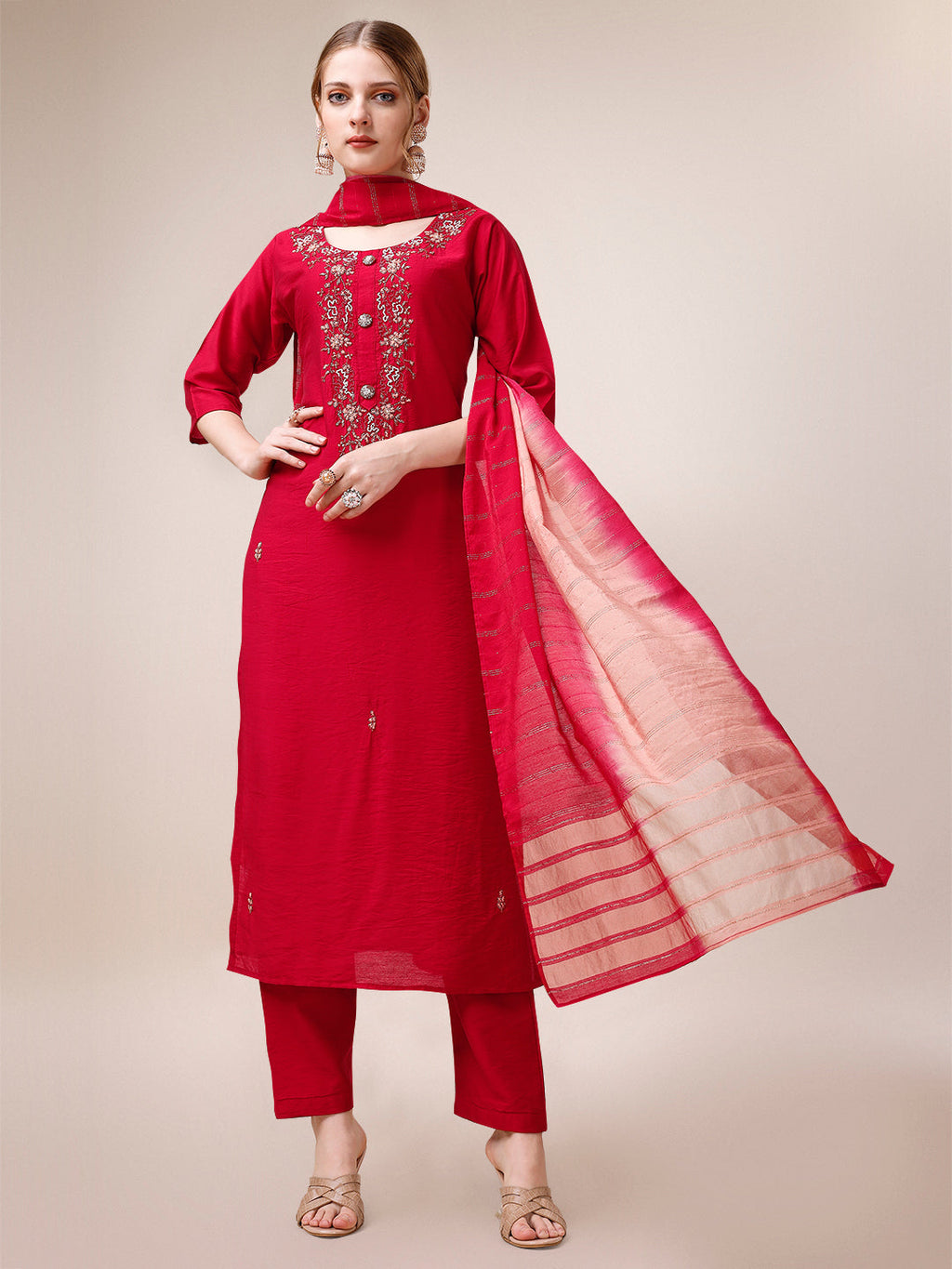 Multicolor hand-embroidered kurta paired with matching pants and a colorful dupatta