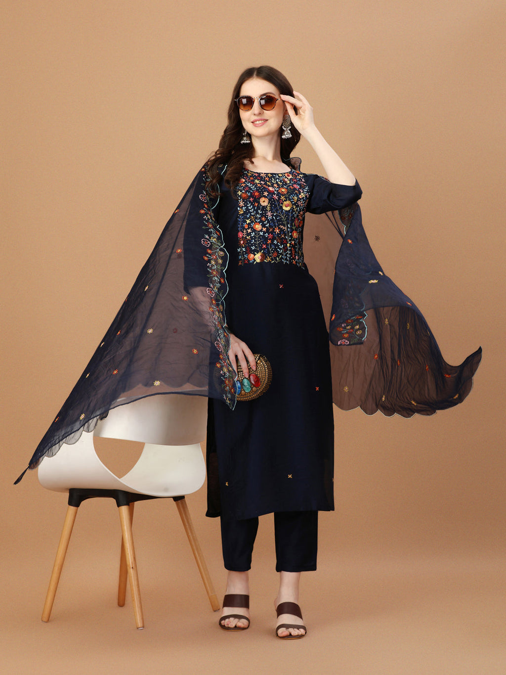 Multicolor embroidered kurta with matching pants and embroidered dupatta.