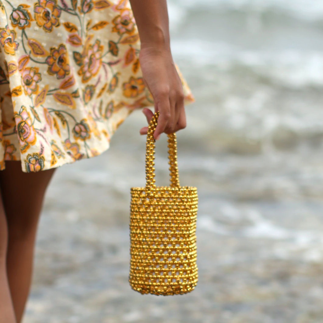 GOLDA Metallic Beads Bucket Bag In Gold