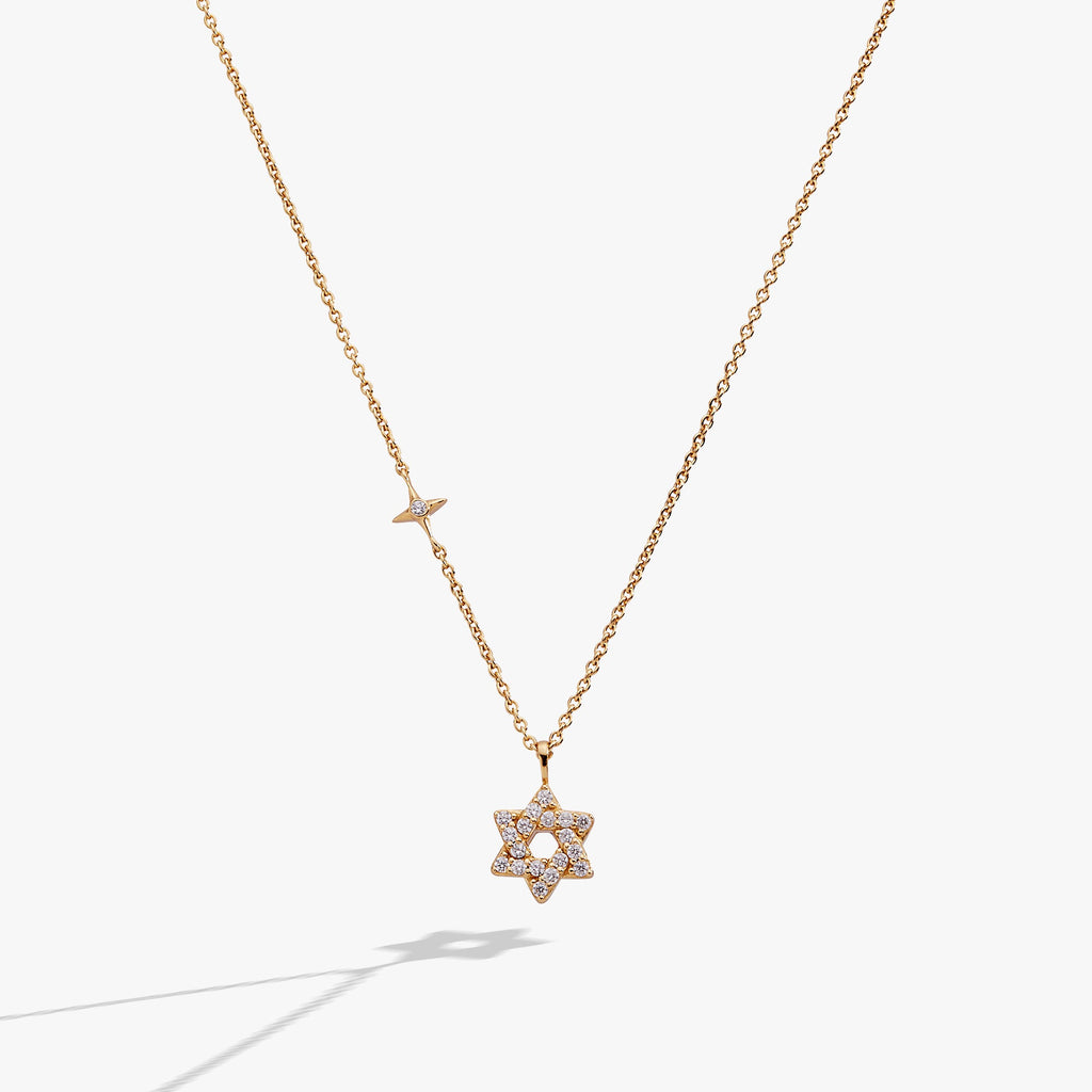 Gold-plated sterling silver Star of David pendant necklace with clear pave crystals.