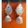 Oxidized silver half moon jhumka earrings with intricate traditional patterns