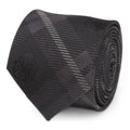 Close up of a black and gray silk plaid tie with a hidden Targaryen dragon sigil and a view of the tie styled with a suit