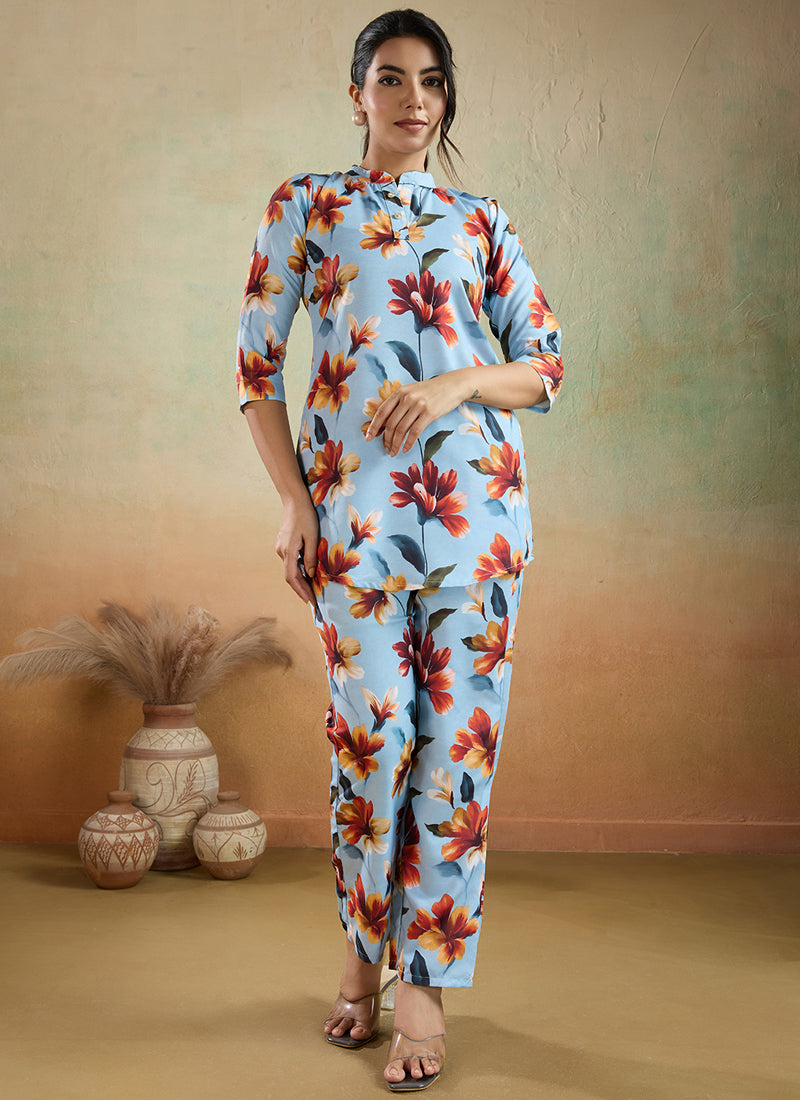 Woman wearing a sky blue printed cotton blend co-ord set with matching pants
