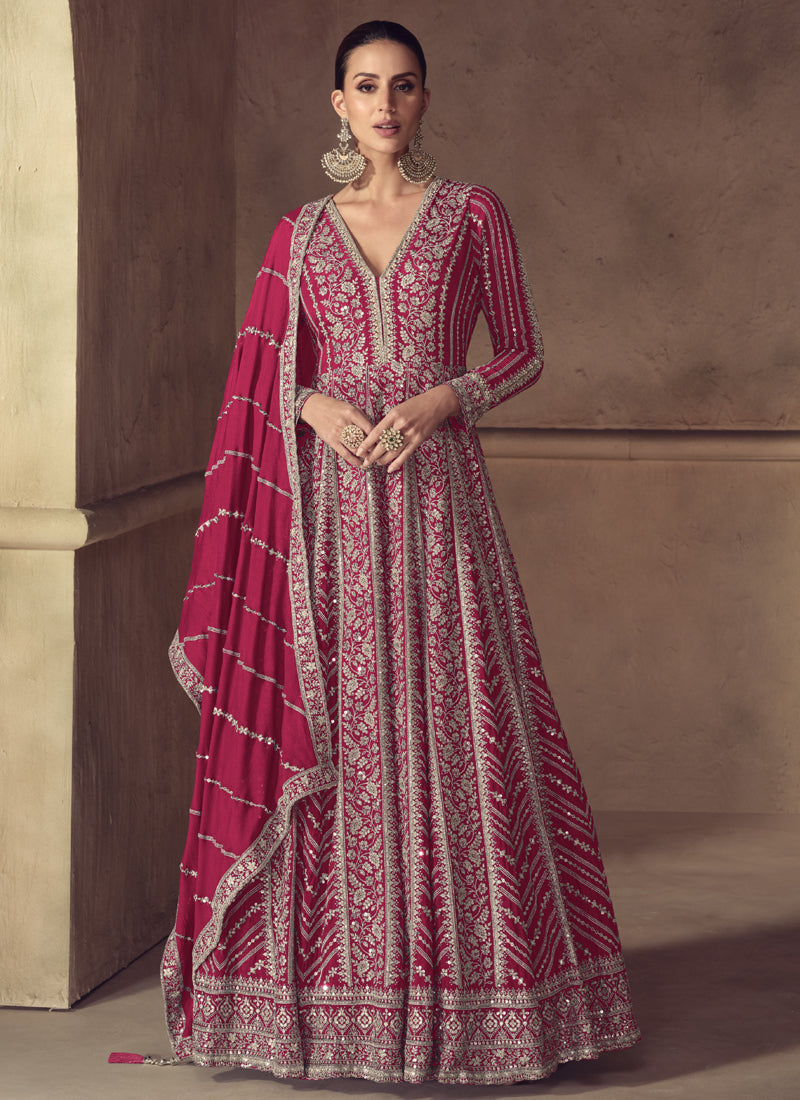 A stunning Rani Pink Chinon silk Anarkali suit with detailed embroidery and gota patti work.
