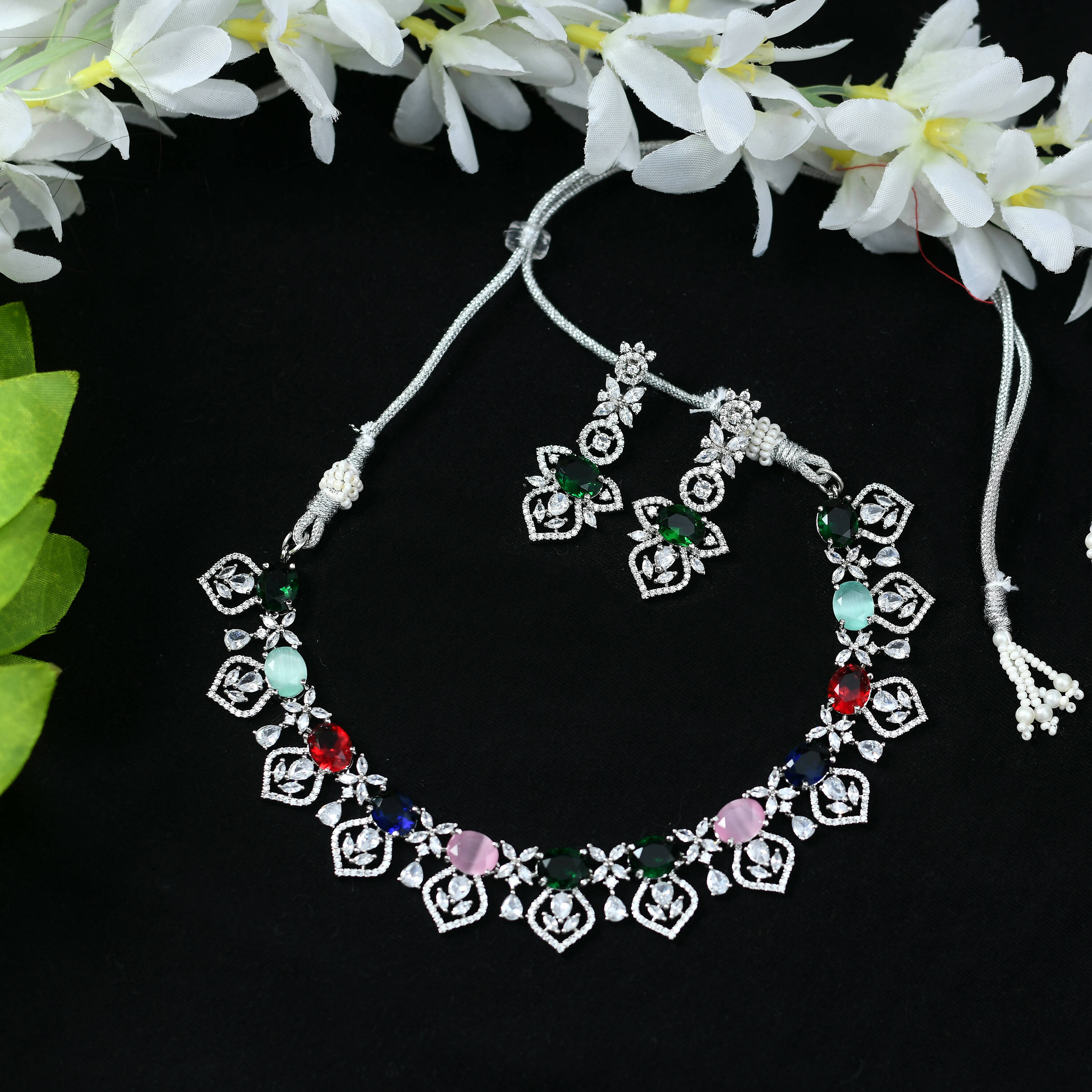 Multi-colored American Diamond choker set with a polished silver-plated finish.