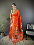 Beautiful orange soft silk Paithani saree with intricate zari floral motifs and a matching blouse piece.
