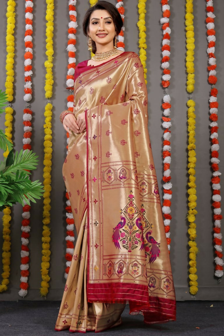 Maroon Paithani silk saree with intricate zari woven work and matching blouse piece.