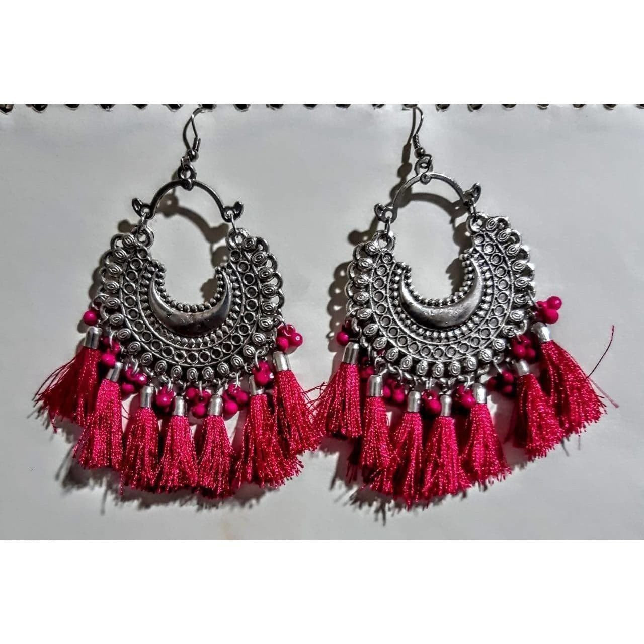 Handmade red thread earrings featuring glass pearl accents in a traditional jhumka design.
