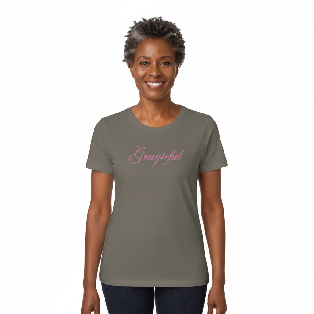 Close-up of a fitted gray cotton crew neck tee with soft pink Grayteful graphic lettering.