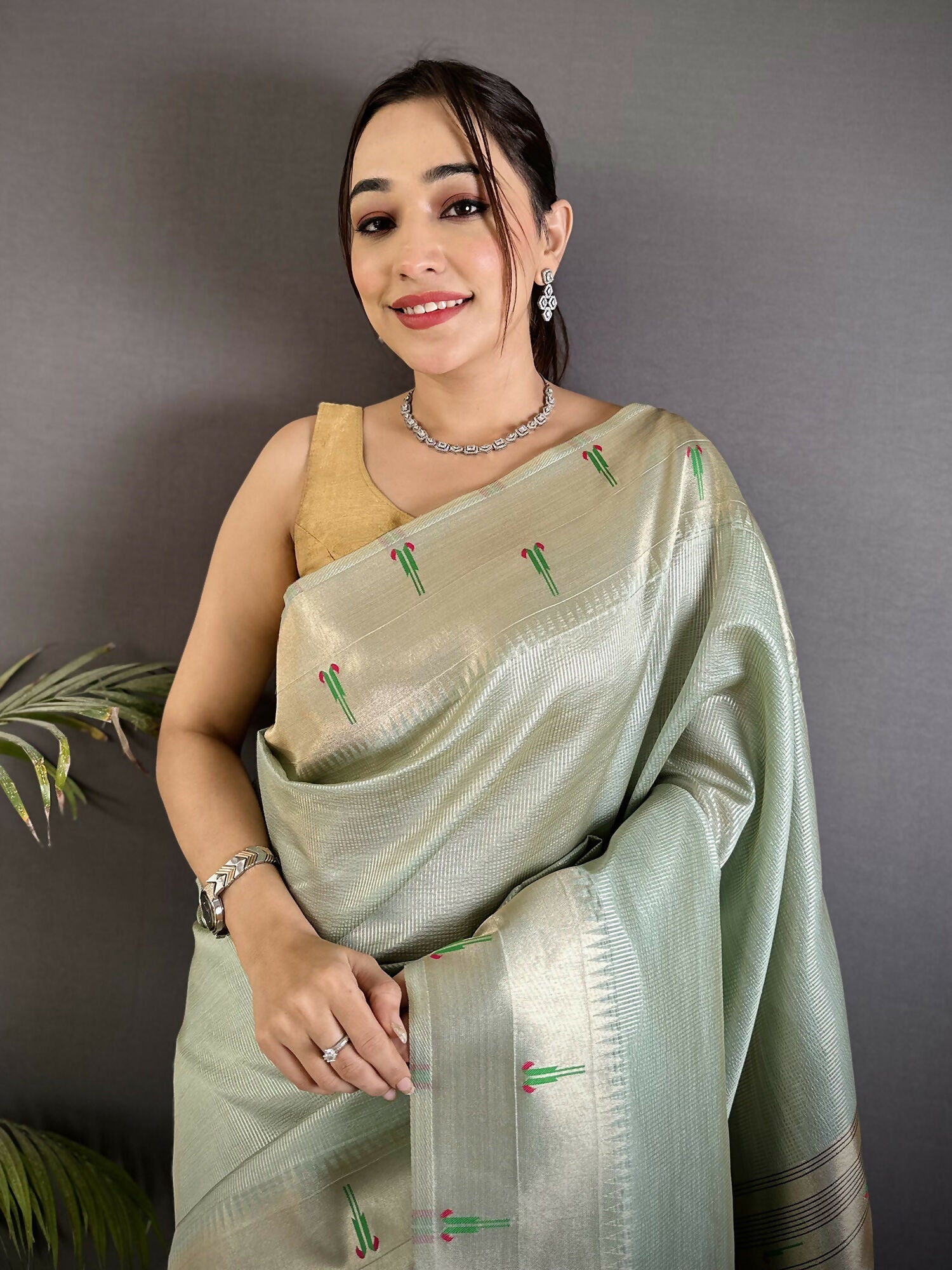 Pale Blue Tissue Paithani Saree with Peacock and Floral Motifs