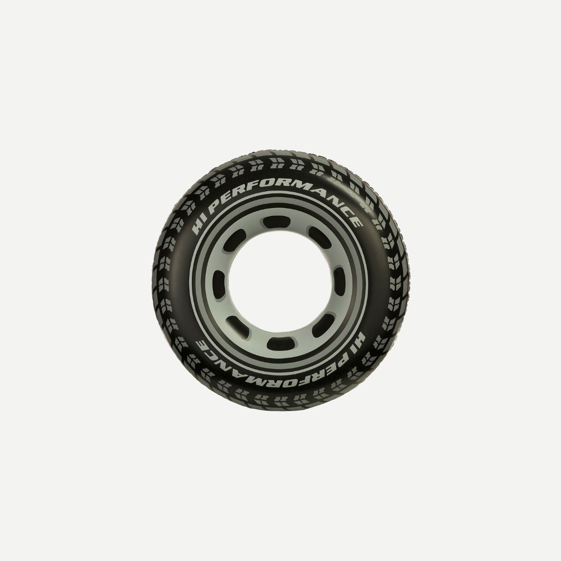 A giant inflatable black tire pool tube with white lettering sitting on a white background.