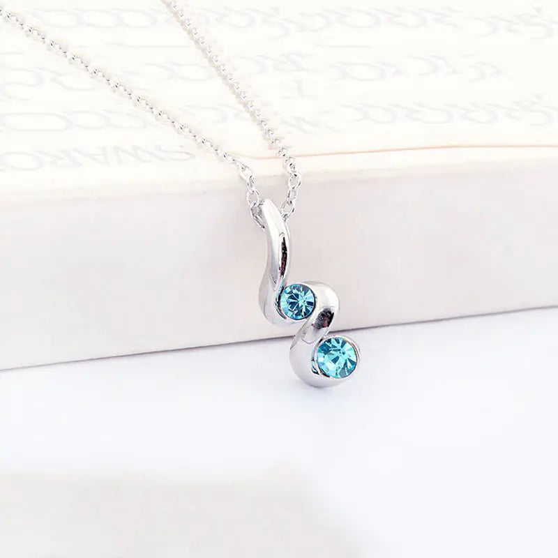 Snake-Shaped Oval Earrings and Necklace Set with Crystals