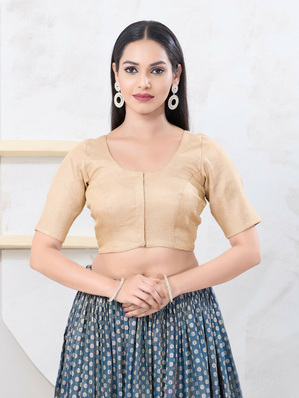 Light-gold tissue blouse with elbow sleeves and front-open design