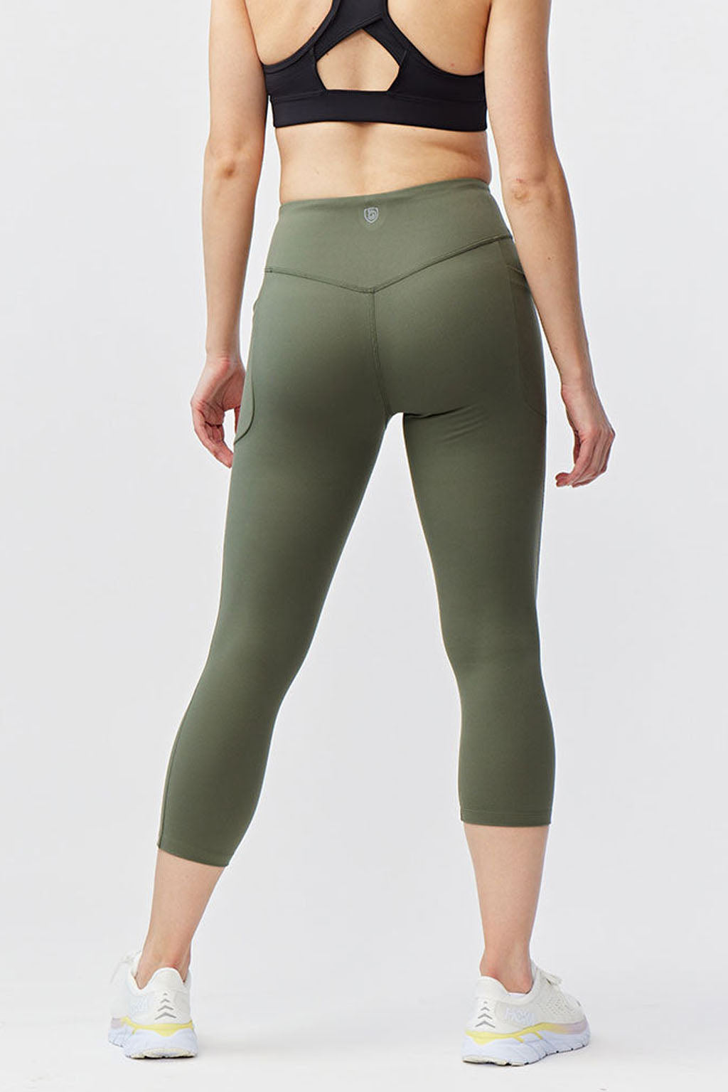 Go Again Women's 21 Inch High-Rise Cropped Leggings in Black - Image 20