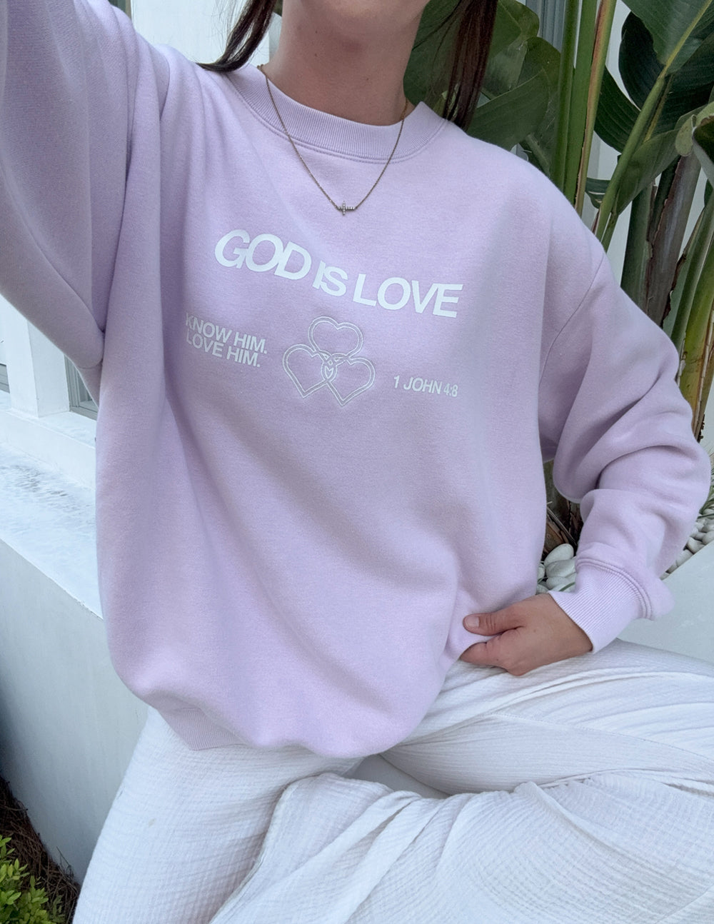 Minimalist God Is Love crewneck in lavender and white knit fabric