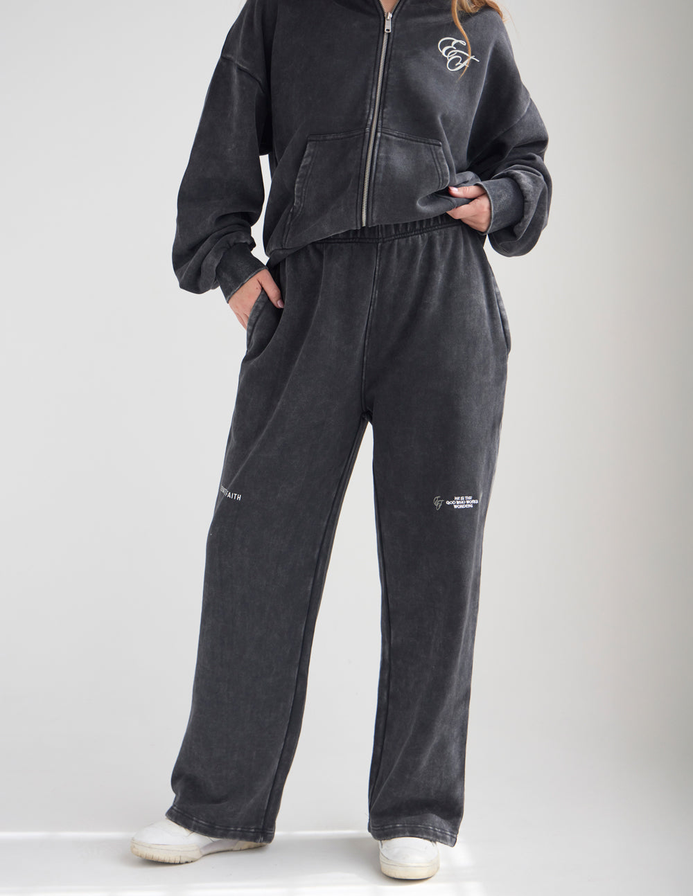 Washed charcoal black wide leg sweatpants with distressed vintage aesthetic