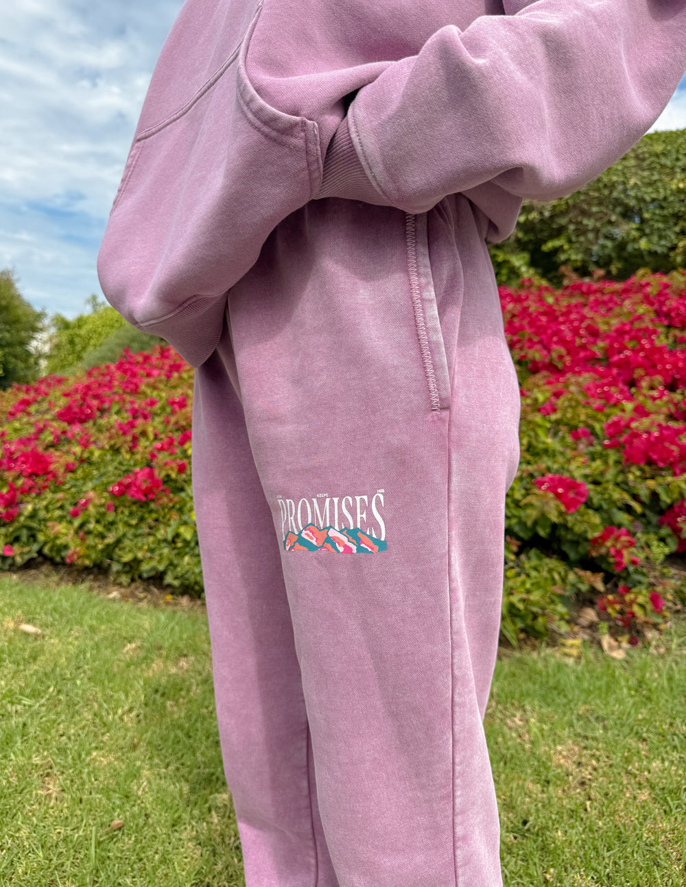 Unisex knit sweatpants in mauve dusty-rose featuring faith-based text design