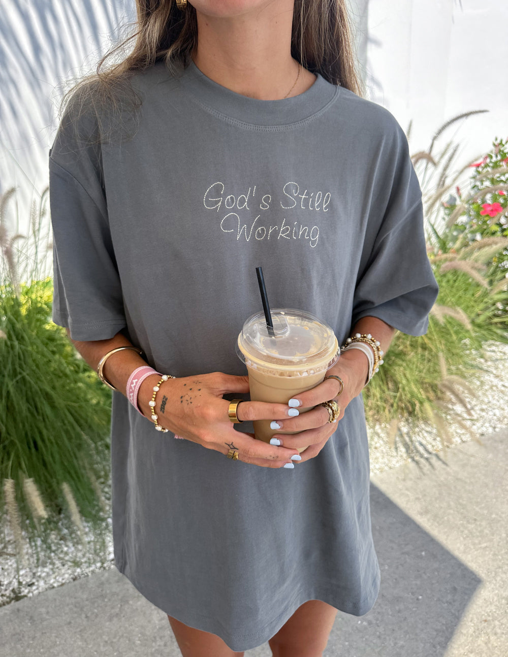 God's Still Working Unisex Graphic Tee in Charcoal Grey