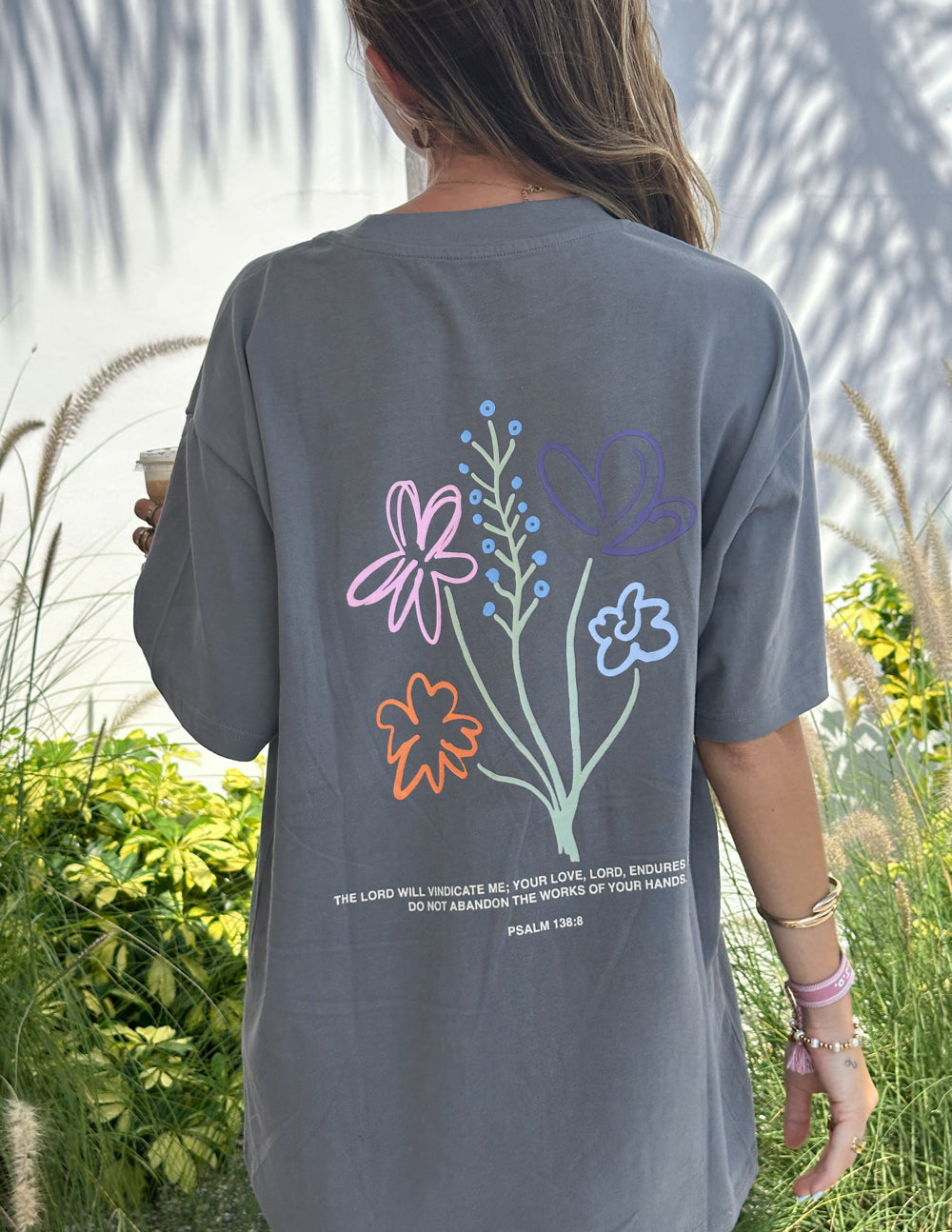 God's Still Working Unisex Graphic Tee in Charcoal Grey