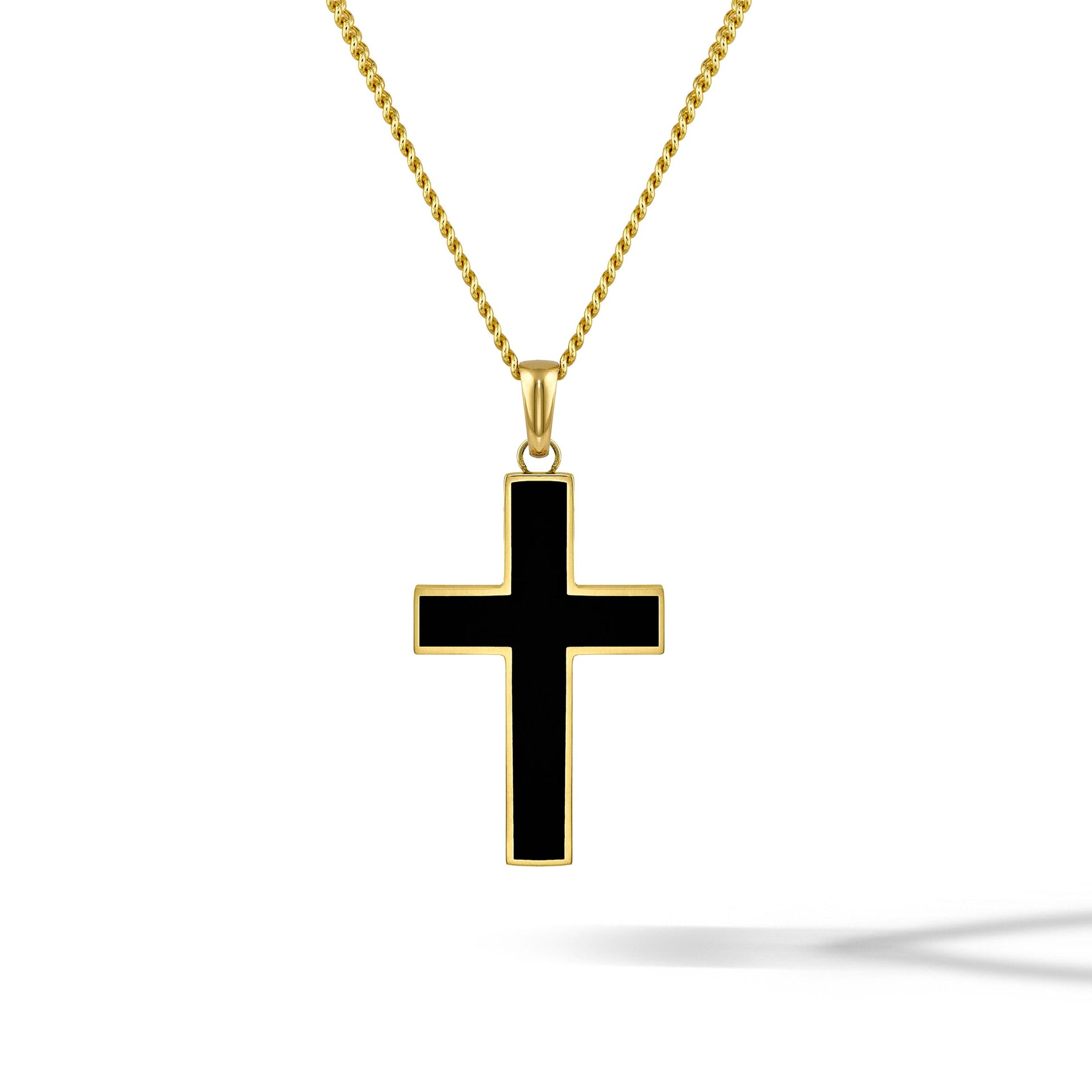 Large 14K Gold and Onyx cross pendant showing clean lines and high-polish finish.