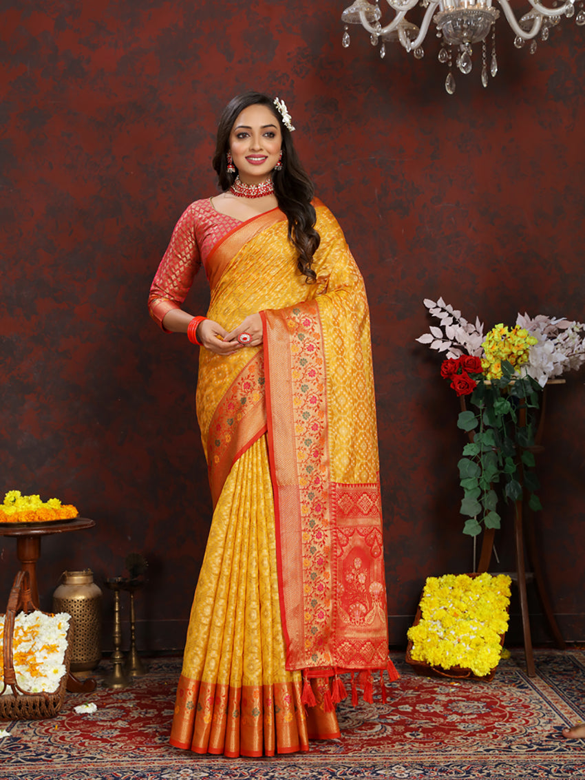 Gold organza silk saree with detailed Meenakari woven pallu